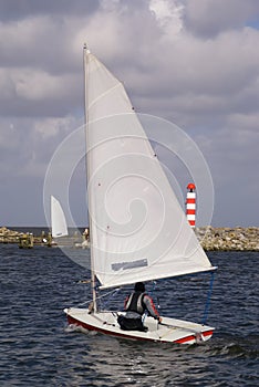 The sailing on a sail boat