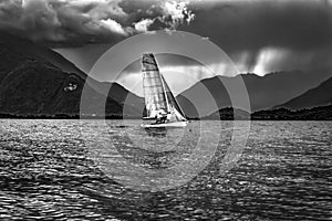 Sailing scene in a storm on Lake Como