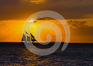 Sailing Schooner at Sunset