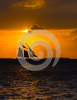 Sailing Schooner at Sunset