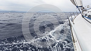 Sailing in the sea in stormy weather.