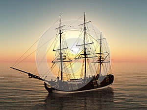 Sailing ship at anchor at sunset