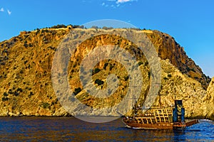 Sailing ship on background of rock