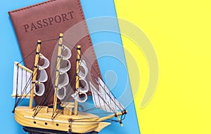 Sailing ship model on blue yellow for travel concept post