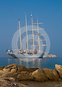 Sailing ship in the sea not far from the shore