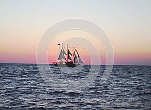 Sailing ship sunset silhouette