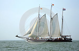 Sailing ship under full sail.