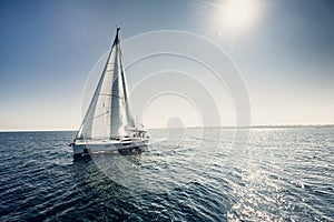 Sailing ship yachts with white sails