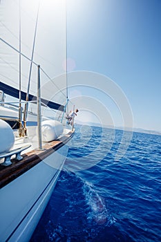 Sailing. Ship yachts with white sails in the open Sea.