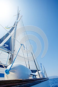 Sailing. Ship yachts with white sails in the open Sea.