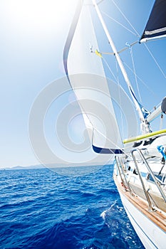 Sailing. Ship yachts with white sails in the open Sea.