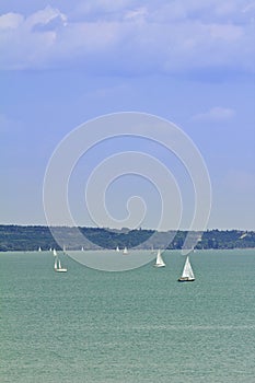 Sailing ships on the lake photo