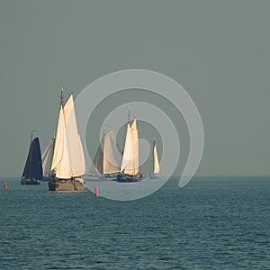 Sailing ships on the lake crossing between Volendam and Marken in the Netherlands