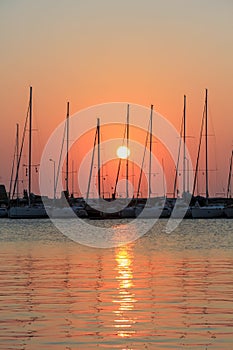 Sailing ships at sunrise at Mandraki Harbor