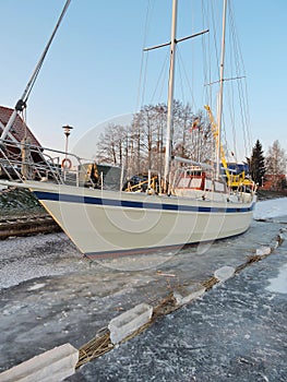 Sailing ship in river ice