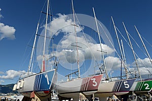 Sailing sports yachts Open 800 in storage at the yacht club \