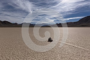 Sailing Stone on a cracked dry lake floor