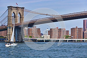 Sailing under the Brooklyn Bridge photo