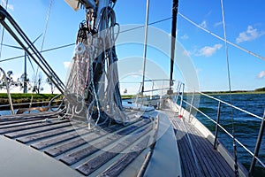 Sailing vessel in action seeing the desitnation and coastline.