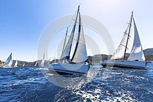 Sailing in the wind through the waves at the Aegean Sea in Greece.