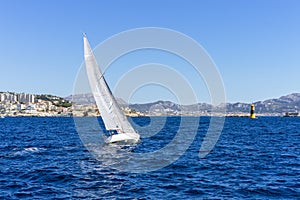 Sailing in the wind through the waves at the Sea
