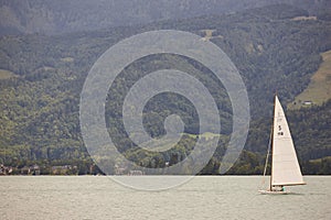 Sailing on Wolfgangsee lake. Salzburg region. Austrian mountain landscape