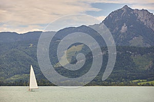 Sailing on Wolfgangsee lake. Salzburg region. Austrian mountain landscape