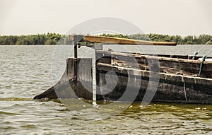 sailing wooden boat, submerged part of the steering boat rudder blade