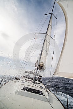 Sailing yacht in action in the evening in Mediterranean