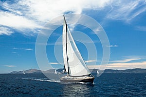 Sailing yacht boat on ocean water, outdoor lifestyle.