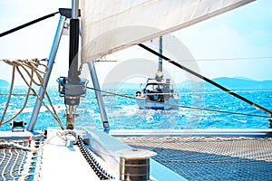 Sailing yacht catamaran in the sea in Greece, turquoise waters of Aegean Sea near Athens