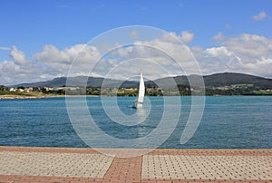 sailing yacht close to the coast