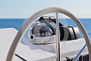 Sailing yacht control wheel and implement