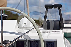 Sailing yacht control wheel and implement