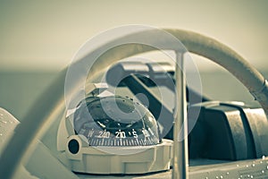 Sailing yacht control wheel and implement. Horizontal shot without people