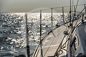 Sailing into the sunset on a sailing yacht