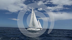 Sailing yacht race. Luxury yachts. Boats in sailing regatta. Sailing ship yachts with white sails.