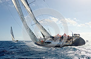 Sailing yacht race. Yachting. Sailing yachts in the sea photo