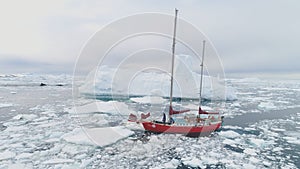 Sailing yacht travel in antarctica brash ice ocean