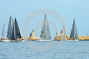 Sailing yacht race. Yachting. Sailing yachts in the sea