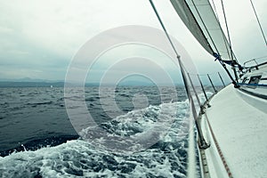 Sailing yachts in the Aegean sea in stormy weather. Yachting.