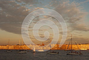 Sailing yachts in the evening in the delta of the Neva River.