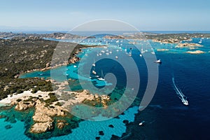 Sailing yachts near islands between Sardinia and Corsica