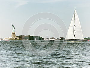 Sailingboat boating near Statue of Liberty