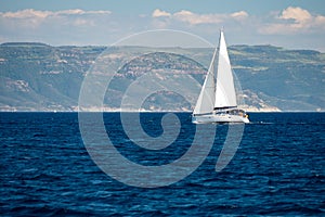 A sailingboat at sea outside the coast of Corsica