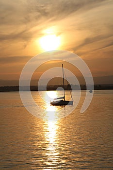 Sailingboat by sunset