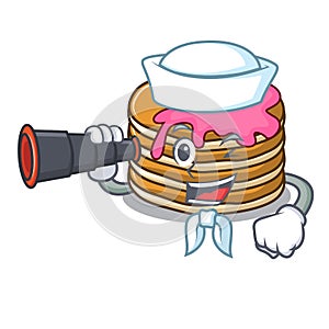 Sailor with binocular pancake with strawberry mascot cartoon