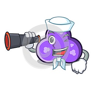 Sailor with binocular trefoil mascot cartoon style