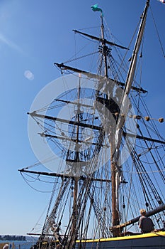 Sailor climbs the rigging