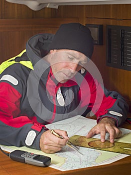 Sailor at navigation table